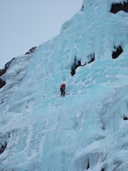 Abseiling down from the ice cave